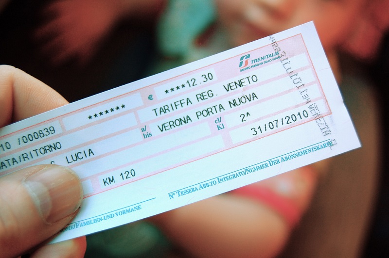 Hand holding train ticket from Venice to Verona