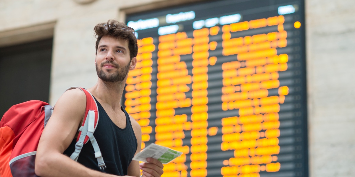 Young Man travelling on Train. Travelling Italy by train