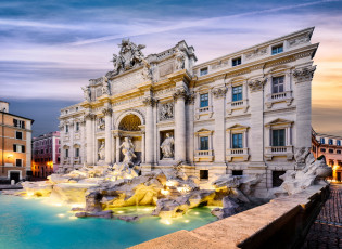 the majestic trevi fountain in the center of piazza di trevi, italy at sunrise. the marble architecture is illuminated by golden light, and water splashes can be seen from under the sculptures.